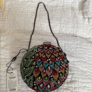 Vibrant Beaded Peacock Clutch